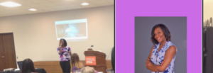 Speaker presenting at a conference with a projected screen and audience.